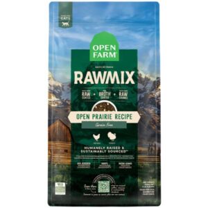 A bag of Open Farm RawMix Open Prairie Recipe for Dogs, featuring mountain, barn, and chicken images. The grain-free RawMix packaging highlights raw coating, broth, and raw chunks.
