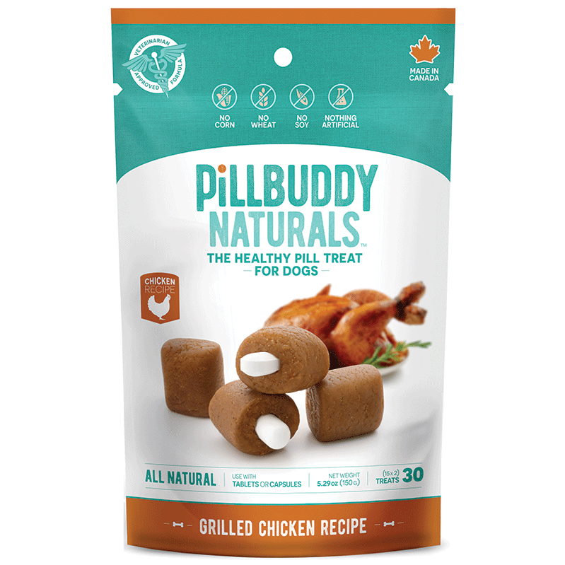 A bag of Pill Buddy Naturals Grilled Chicken Recipe dog treats, featuring images of the treats and grilled chicken. The packaging highlights that the treats are all-natural and free of corn, wheat, soy, and artificial ingredients.