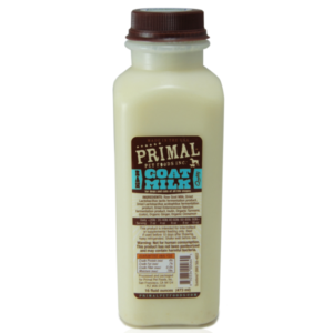 A plastic bottle of Primal raw goat milk for pets. The bottle features a brown cap and a brown label with nutritional information and product details.