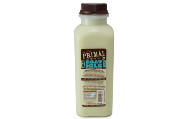 A plastic bottle of Primal raw goat milk for pets. The bottle features a brown cap and a brown label with nutritional information and product details.