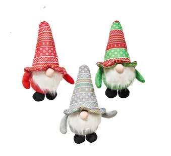 Three plush gnomes with long white beards, round noses, and patterned hats in red, green, and gray colors, each wearing matching mittens and black shoes, positioned against a white background.